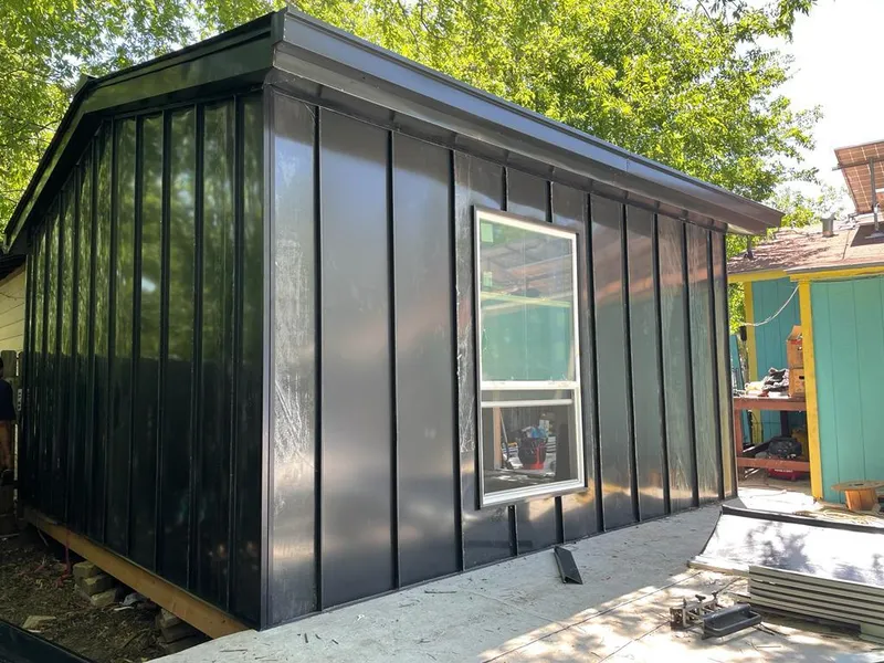 Black standing seam metal wall panels for Roof Inspection in South Williamsport